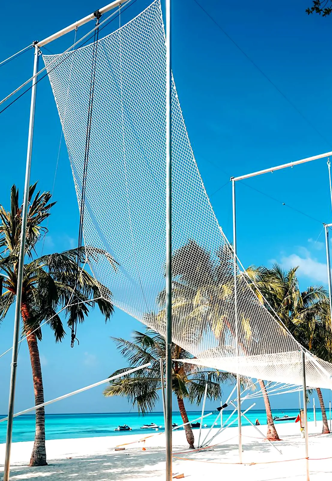 Complete full-size flying trapeze rig on a beach — Maldives — MACA flying trapeze rig